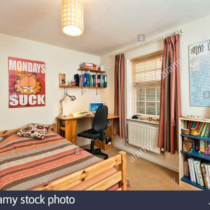A Typical Teenage Student Bedroom Or Dorm Accommodation